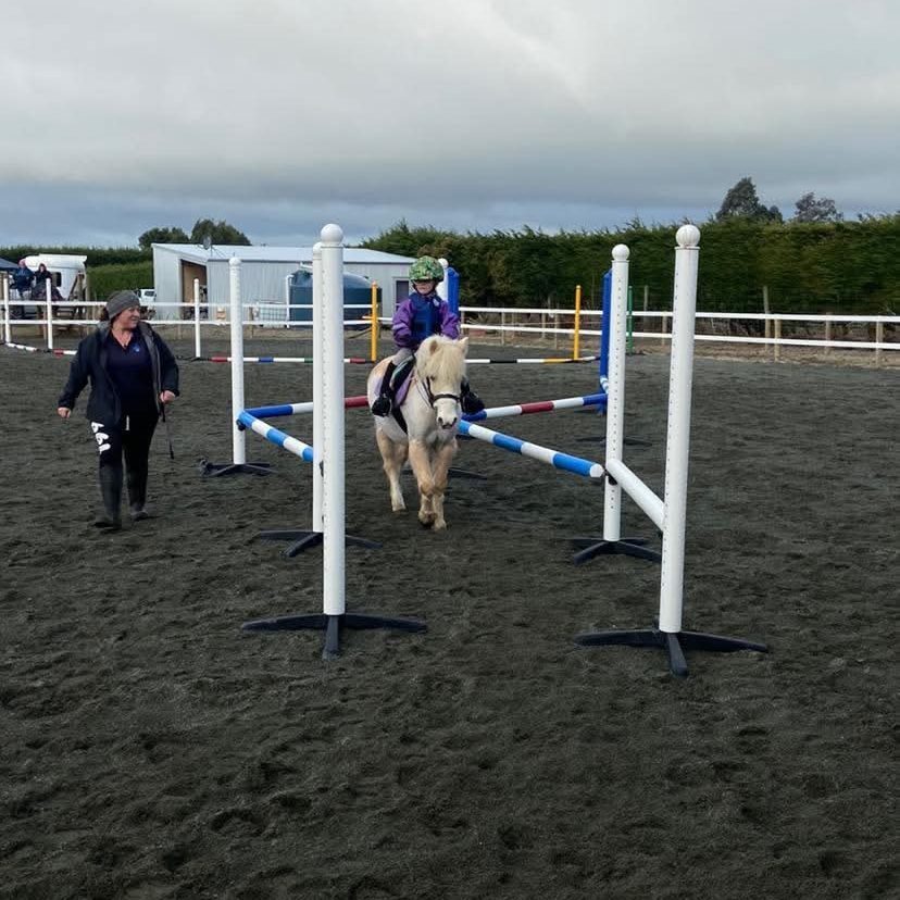 Horse jumping training at Reigning Downs Hauora Centre in New Zealand.